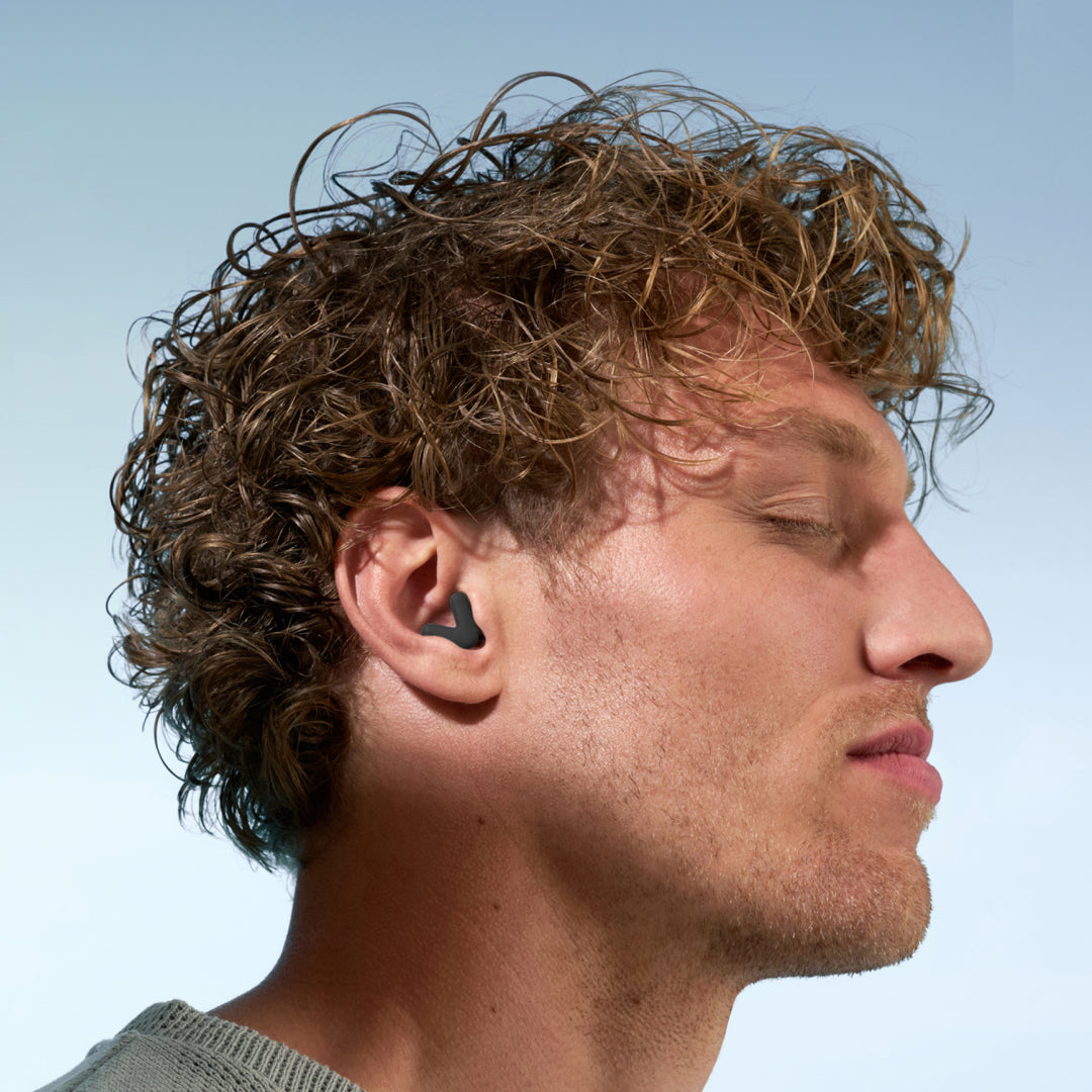 Guy wearing a black alpine silence 